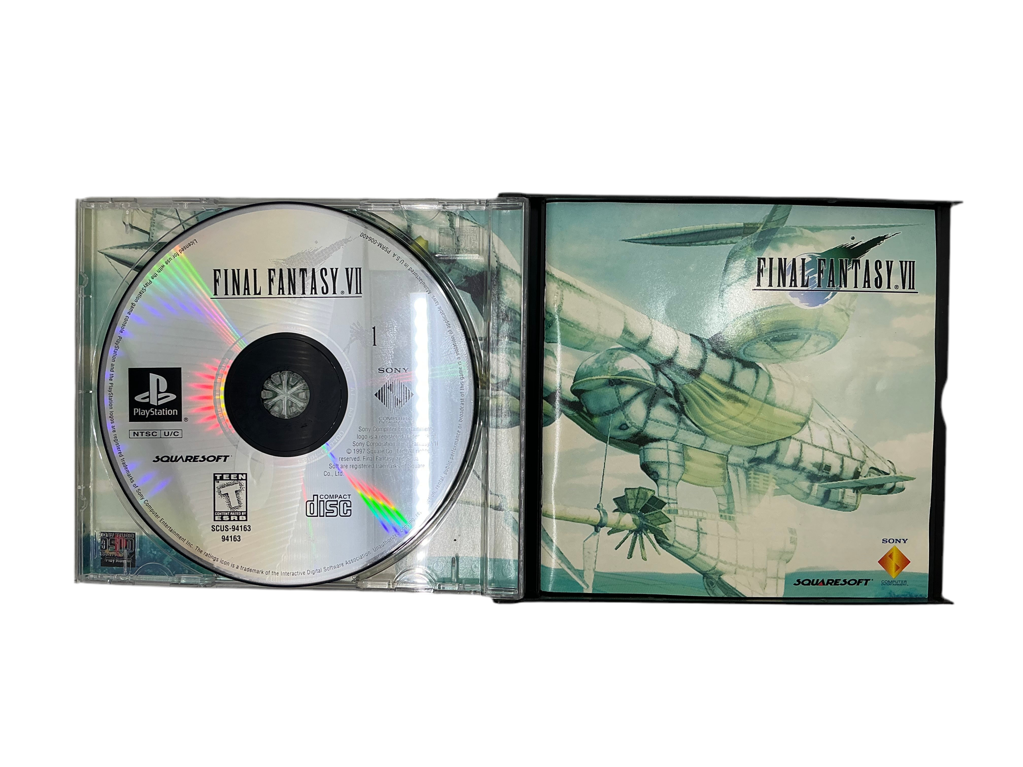 Open game case featuring the first game disc and the game manual.