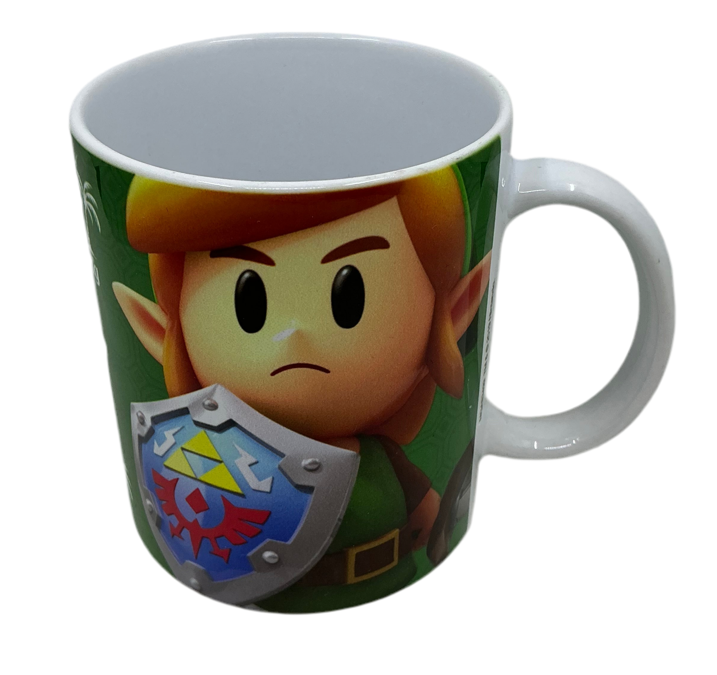 Mug with a character design featuring a shield on a green background