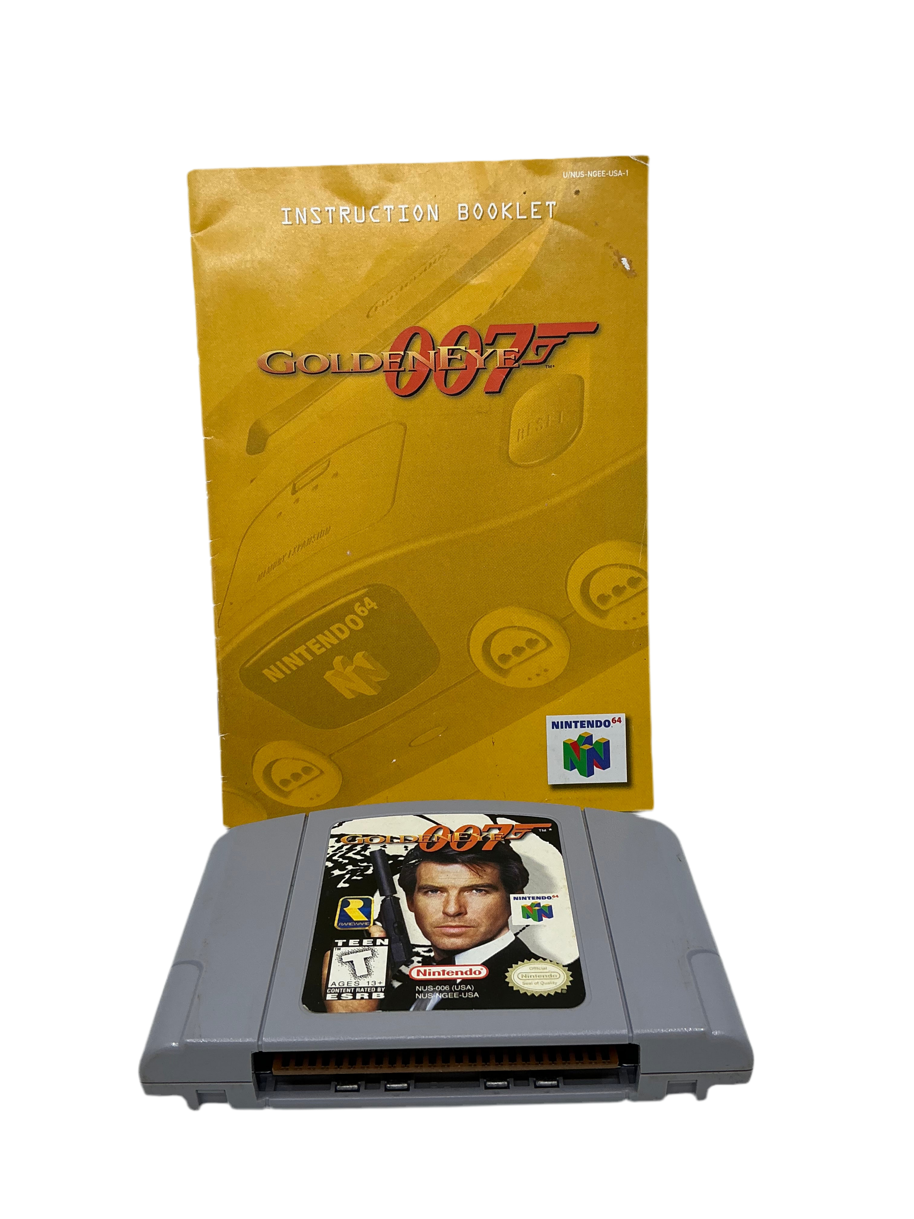 Photo of game manual and cartridge for N64 game GoldenEye 007. The manual has minor crinkles and is used. The cartridge is clean.