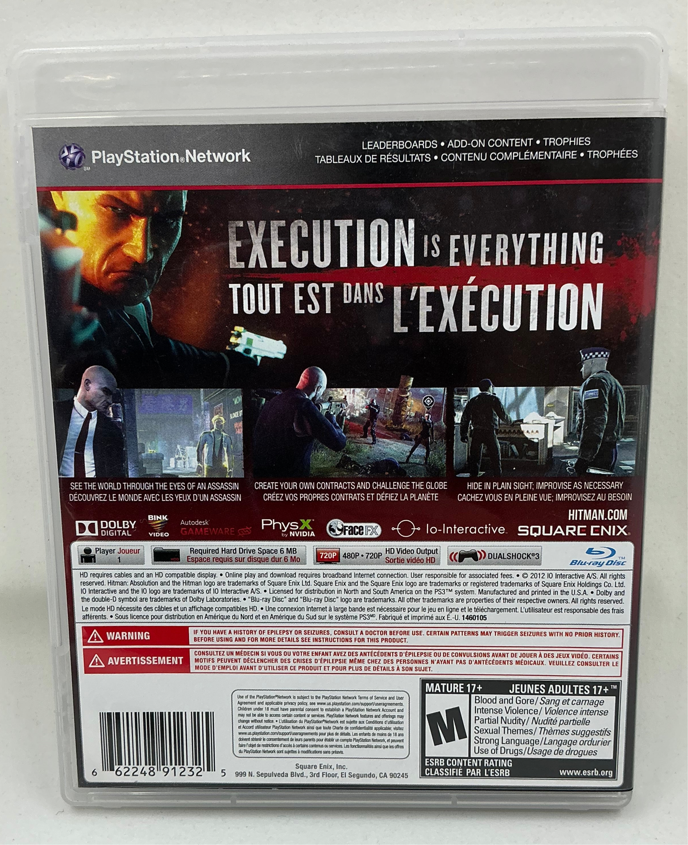 Back cover of Hitman Absolution game case for PlayStation 3 on a transparent background.
