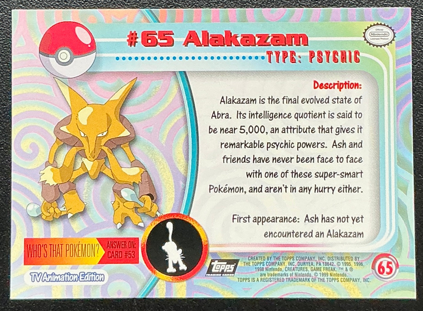 Pokémon Topps Alakazam #65 Series 1 (Black Logo)