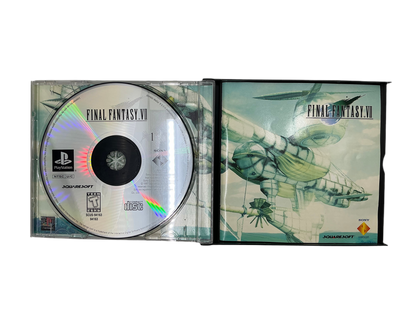 Open game case featuring the first game disc and the game manual. 