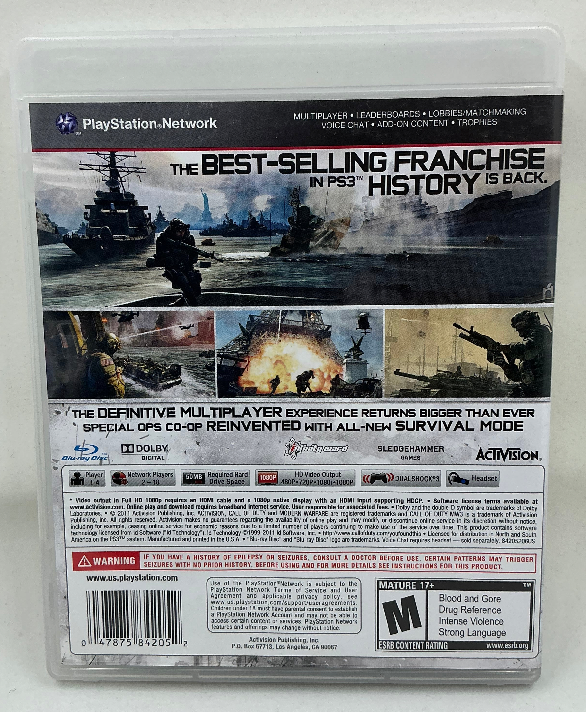Back cover of Call of Duty Modern Warfare 3 game with military-themed graphics and text.