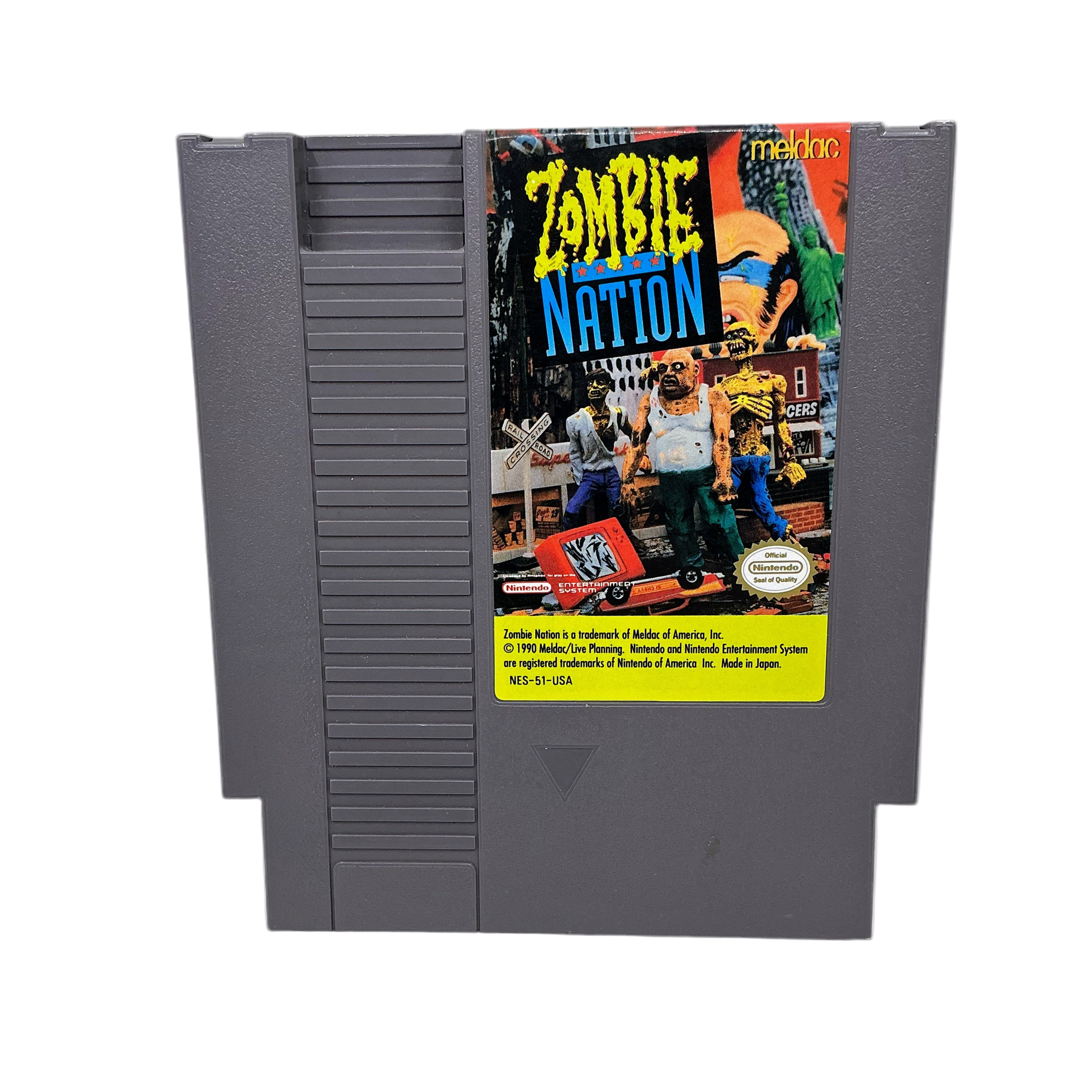Nes game cartridge with 'Zombie Nation' cover art on a white background