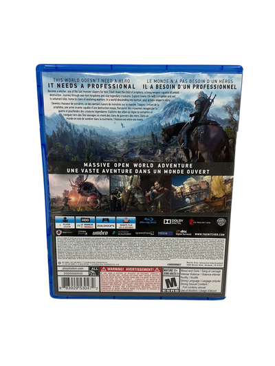  Back cover of The Witcher III game case with a horse and rider on a mountain landscape.