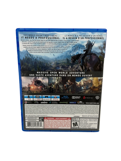  Back cover of The Witcher III game case with a horse and rider on a mountain landscape.