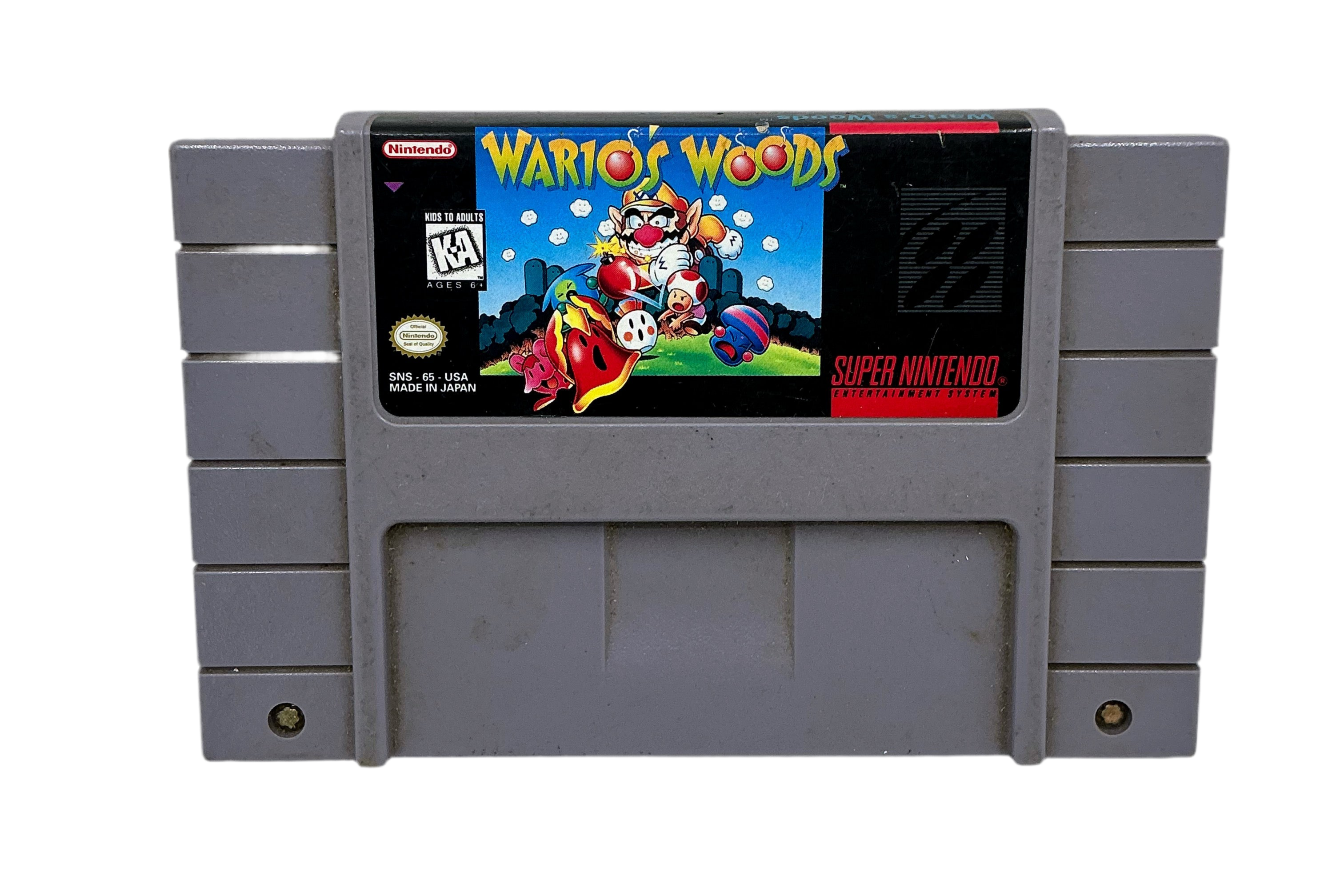 Super Nintendo Entertainment System game cartridge for 'Wario's Woods' on a white background