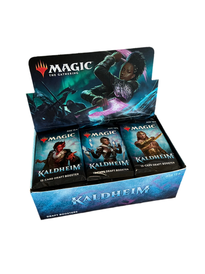 An open, full booster box of Magic the Gathering Kaldheim booster packs.