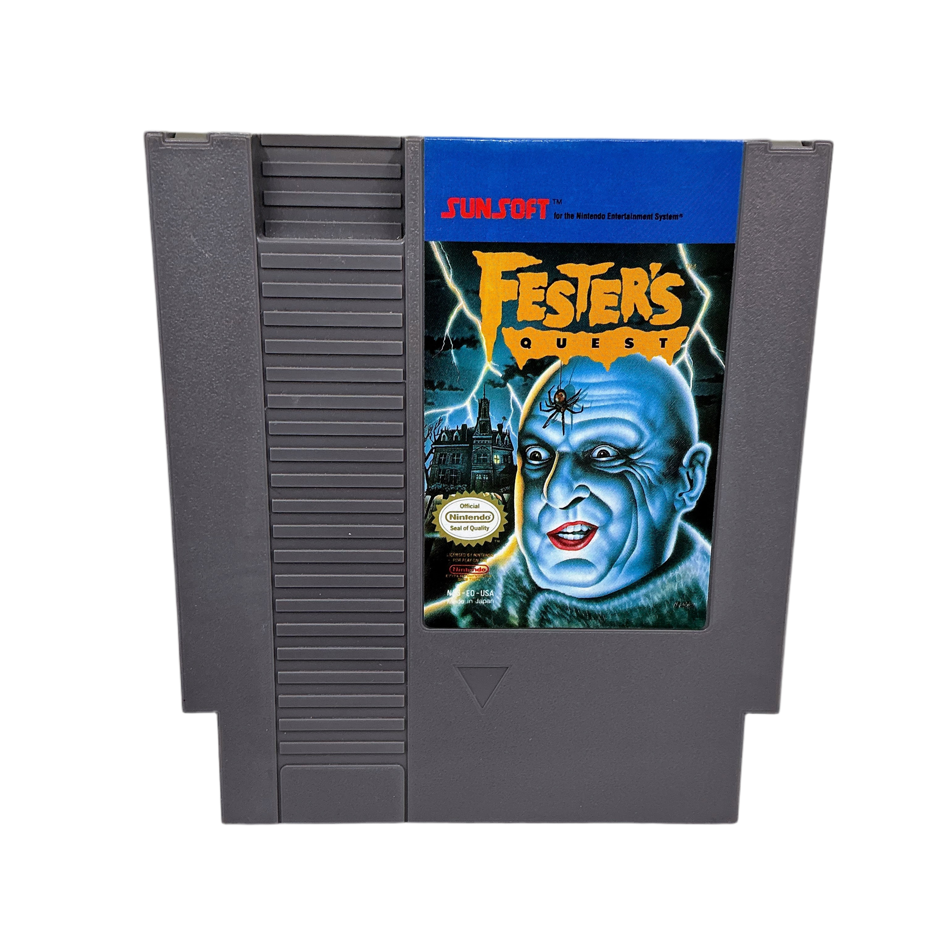 Front side of Fester’s Quest game cartridge for classic Nintendo on a transparent background.
