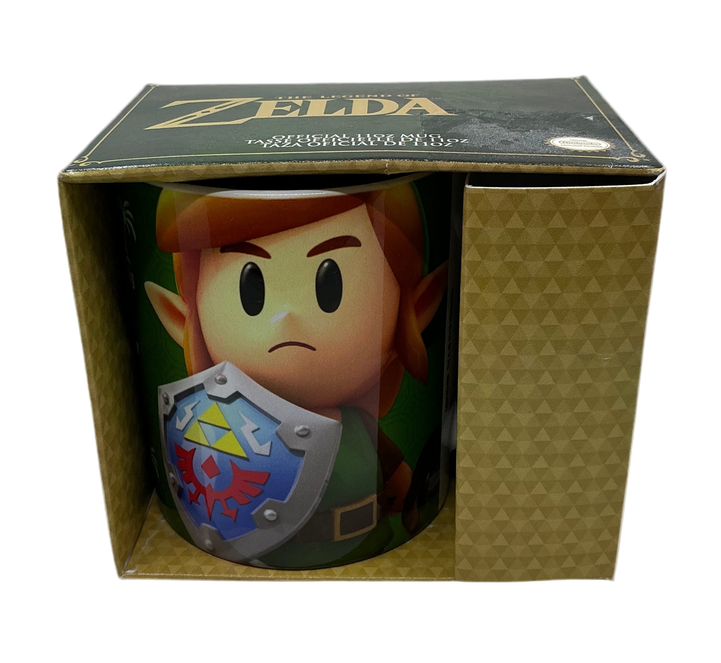 Mug with simplistic character art of Link from Link's Awakening in a 'The Legend of Zelda' box.