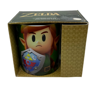 Mug with simplistic character art of Link from Link's Awakening in a 'The Legend of Zelda' box.