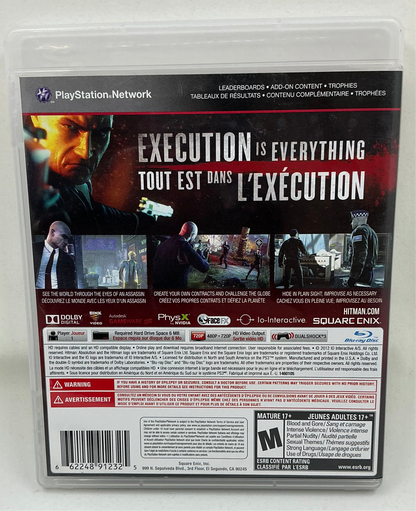 Back cover of Hitman Absolution game case for PlayStation 3 on a transparent background.