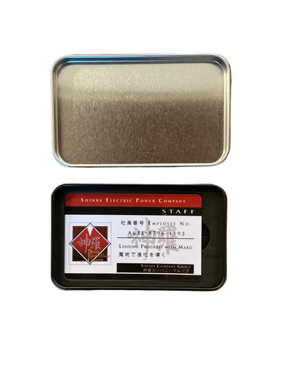 An open Final Fantasy 7 remake tin that shows a mockup of an ID card for the Shinra Company.