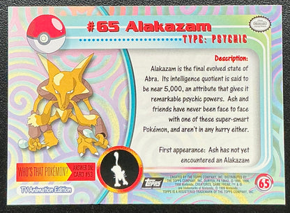 Pokémon Topps Alakazam #65 Series 1 (Black Logo)